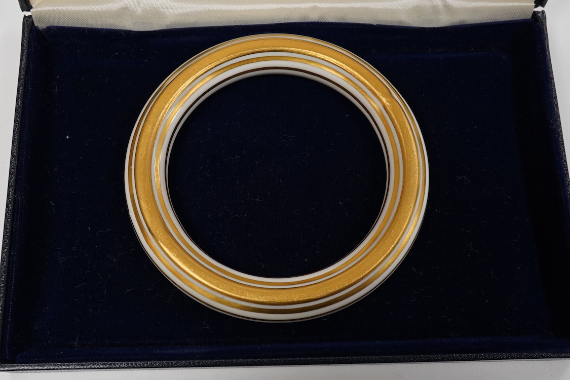 A 9ct and cabochon black onyx set pendant, on a 9ct chain, a 9ct and gem set ring and pair of 9ct and cultured pearl set ear clips, together with other items including costume jewellery, a silver bangle and a silver book